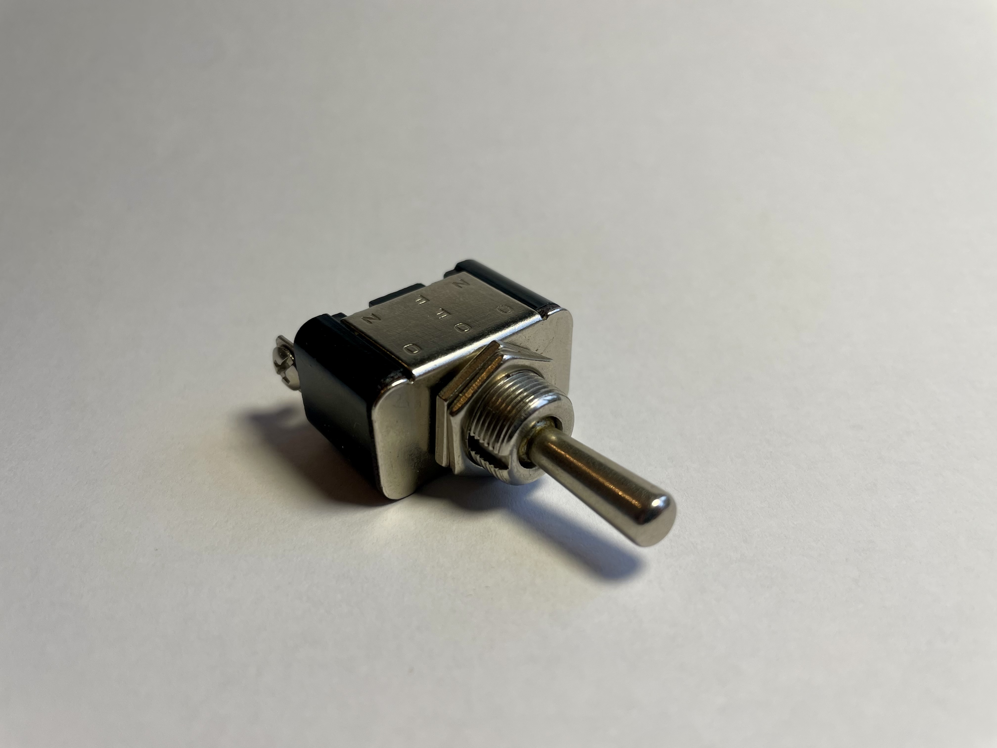 Přepínač páčkový ON-OFF-ON 3p.